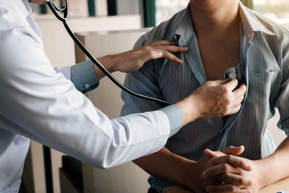 Doctor performing physical exam